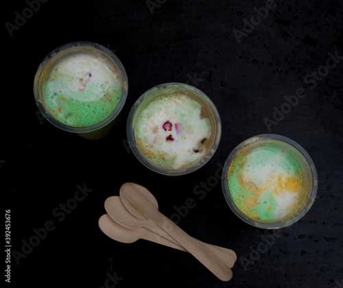 Top view of gadbad ice cream in a plastic glass. photo