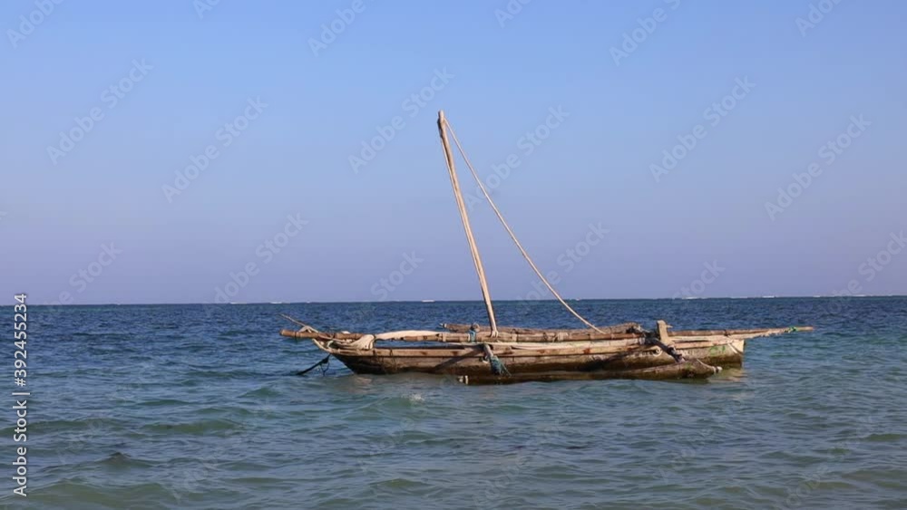 A traditional Boat at Diani Beach - Galu Beach - Kenya, Africa A traditional Boat at Diani Beach - Galu Beach - Kenya, Africa