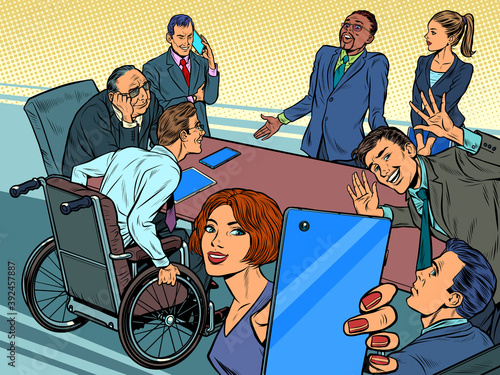 Business meeting. Colleagues of different races, disabled people work in the office and take photos
