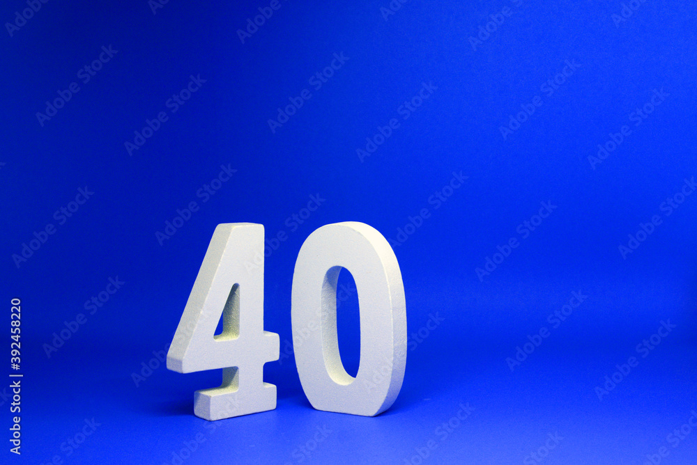No 40 ( Fourty ) Isolated Blue Background with Copy Space - Number 40 Percentage or Promotion - Discount or anniversary concept No 40 ( Fourty ) Isolated Blue Background with Copy Space - Number 40 Percentage or Promotion - Discount or anniversary concept