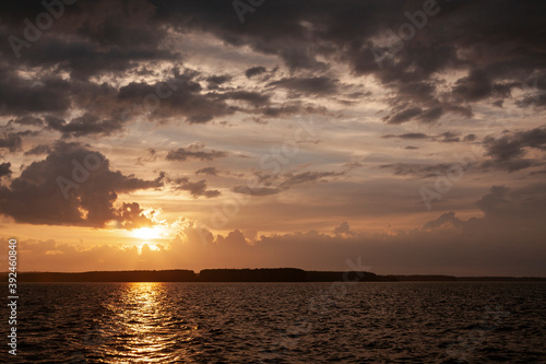 sunset over the sea © oleg_ru