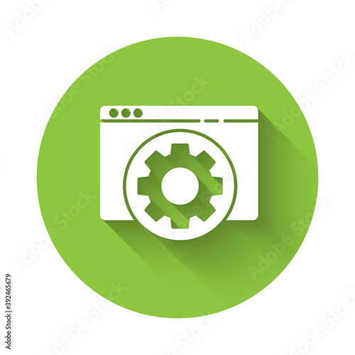 White Browser setting icon isolated with long shadow. Adjusting, service, maintenance, repair, fixing. Green circle button. Vector Illustration.