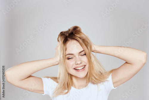 emotional blonde white t-shirt close-up studio lifestyle fun