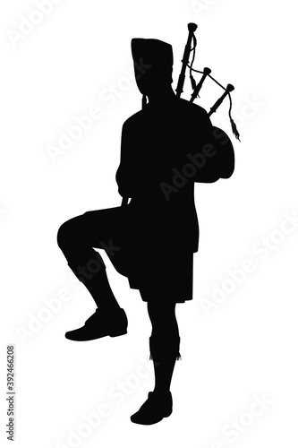 Scottish man bagpipers in traditional dress silhouette vector on white background