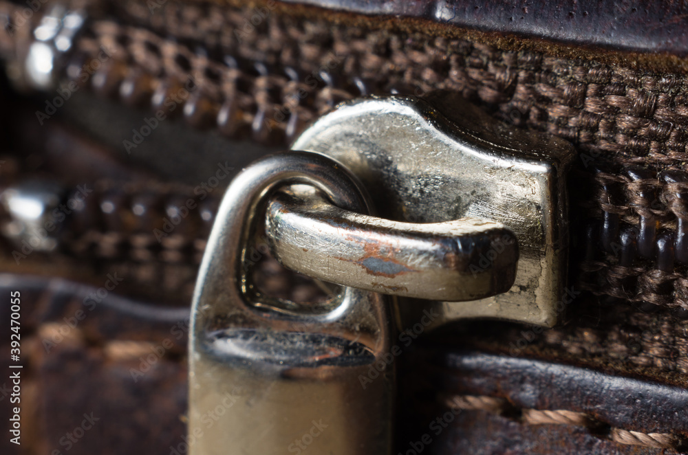 macro photo of an old zipper, zip, fly, dingy, or zip fastener, formerly known as a clasp locker