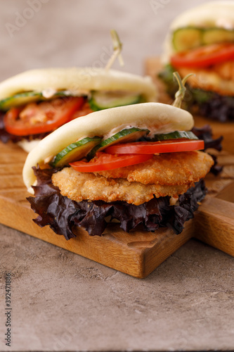 Steamed wheat bun dressed with designer sauce. Vietnamese cuisine concept. Still life. Close-up.