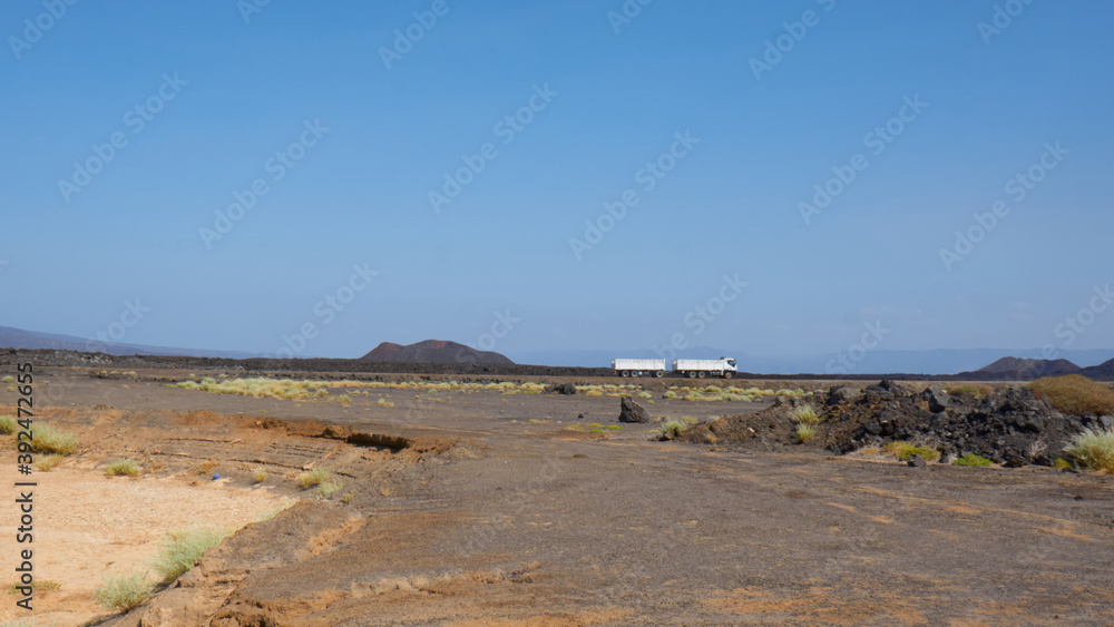 Highway passing through the Lava fields of Djibouti, East Africa
A passing tanker carrying fuel supplies to Ethiopia