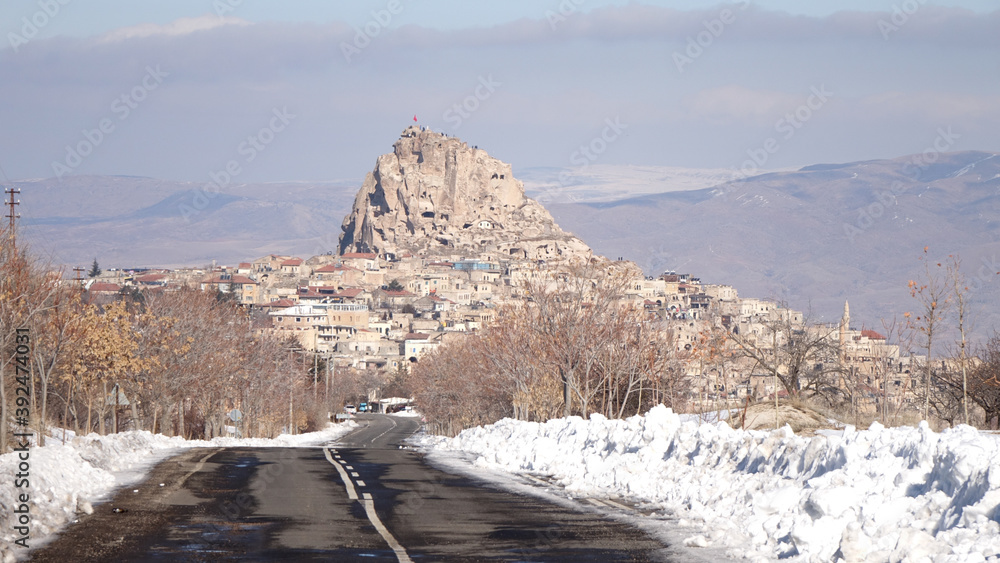Uchisar Rock Castle in Nevşehir during winter at Cappadocia , Turkey.