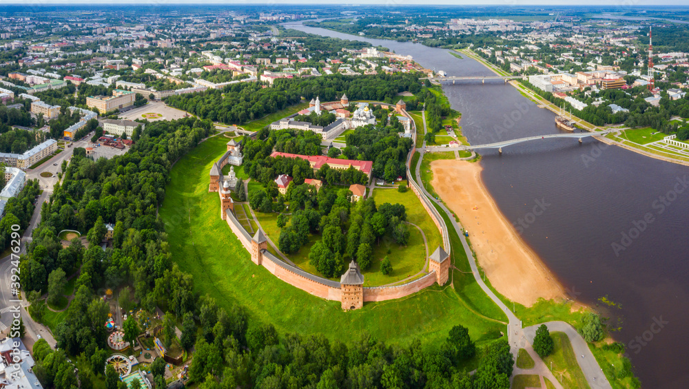Fototapeta premium View of the beautiful ancient Veliky Novgorod, the old part of the city and the Kremlin in summer from a height.