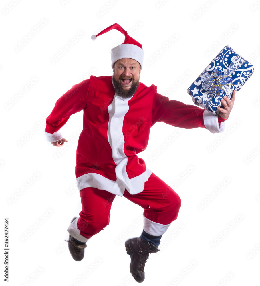 Joyful Santa Claus ning to deliver the gifts studio portrait Joyful Santa Claus ning to deliver the gifts studio portrait