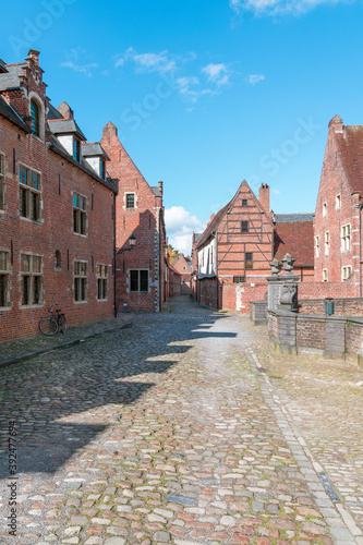 Canvas Print Vertical shot of Groot Begijnhof Leuven in Leuven, Belgium