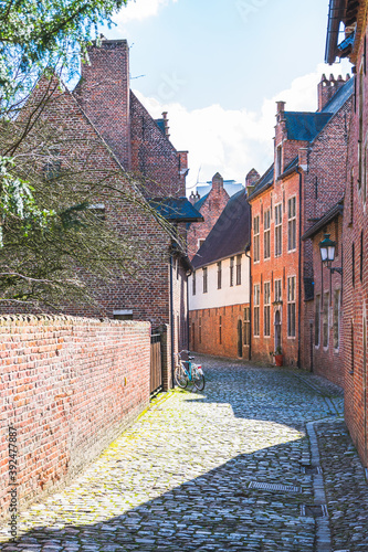 Canvas Print Vertical shot of Groot Begijnhof Leuven in Leuven, Belgium