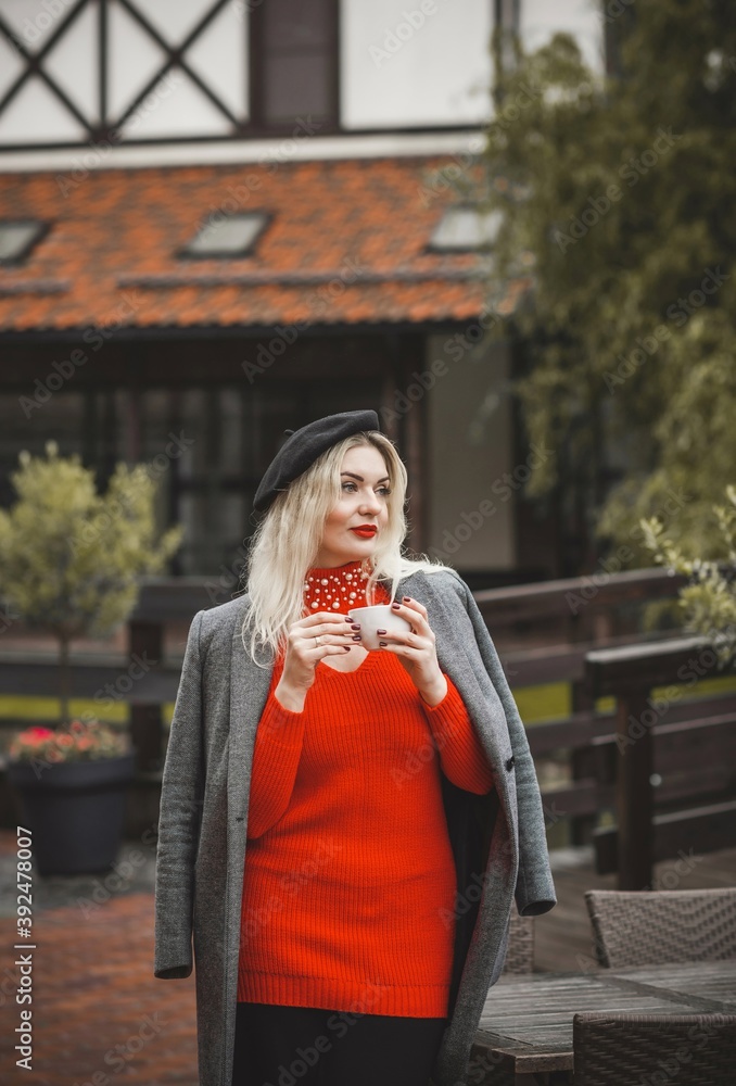 Woman at European cafe, plus size blonde nice woman . Pretty nice girl in restaurant at terrace with a cup of coffee, lifestyle ladies, tourist at Europe Woman at European cafe, plus size blonde nice woman . Pretty nice girl in restaurant at terrace with a cup of coffee, lifestyle ladies, tourist at Europe