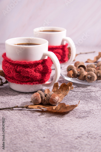 Two cups of acorn coffee. A substitute for coffee. Autumn drink. Vertical orientation.