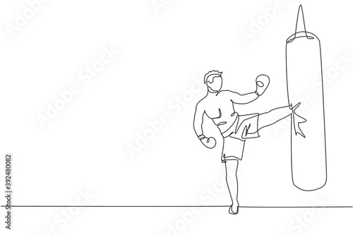 Single continuous line drawing of young sportive man kickboxer exercise side kicking with punch bag in sport hall. Fight competition kickboxing sport concept. One line draw design vector illustration