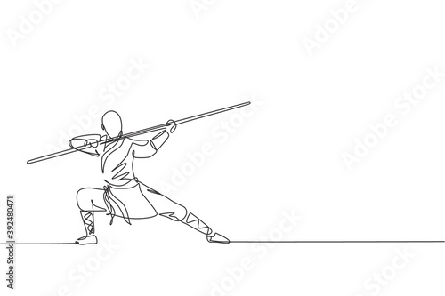 One single line drawing of young energetic shaolin monk man exercise kung fu fighting with stick at temple vector illustration. Ancient Chinese martial art sport concept. Continuous line draw design