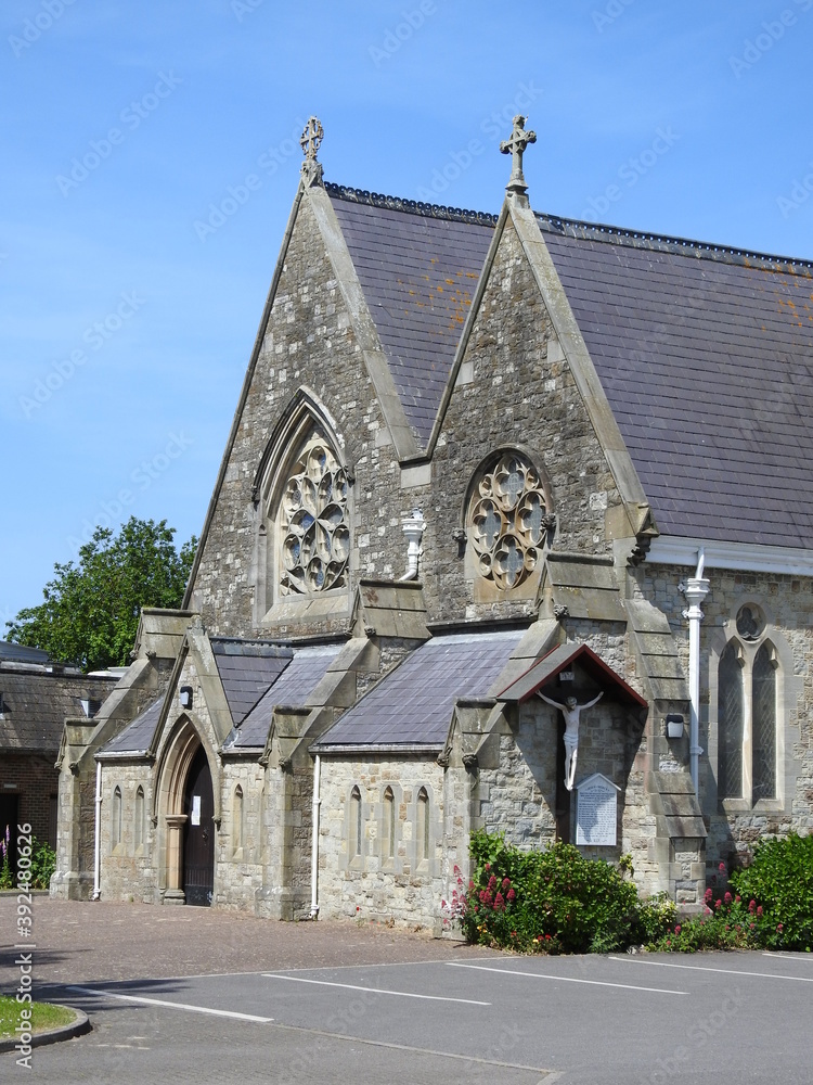 Side view of the front of the old church, rosettes