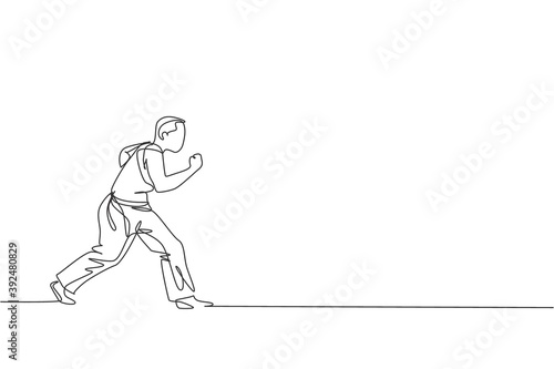 One continuous line drawing of young sporty Brazilian fighter man training capoeira on the beach. Healthy traditional fighting sport concept. Dynamic single line draw design vector illustration