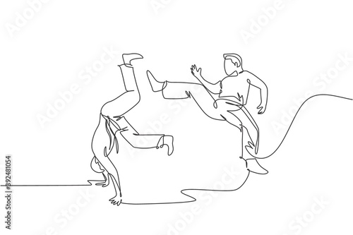 One continuous line drawing of two young sporty Brazilian fighter men training capoeira on the beach. Healthy traditional fighting sport concept. Dynamic single line draw design vector illustration