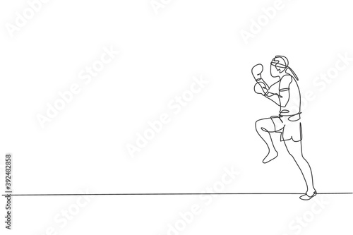One continuous line drawing of young sporty muay thai boxer man preparing to fight  stance kick at box arena. Fighting sport game concept. Dynamic single line draw design vector graphic illustration