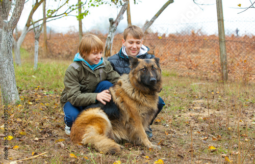 boys with German Shepherd
