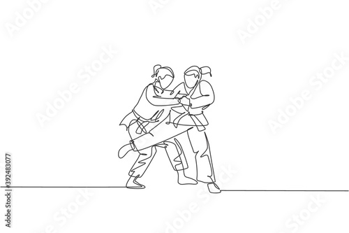 One continuous line drawing two young sporty women training judo technique at sports hall. Jiu jitsu battle fight sport competition concept. Dynamic single line draw design vector graphic illustration