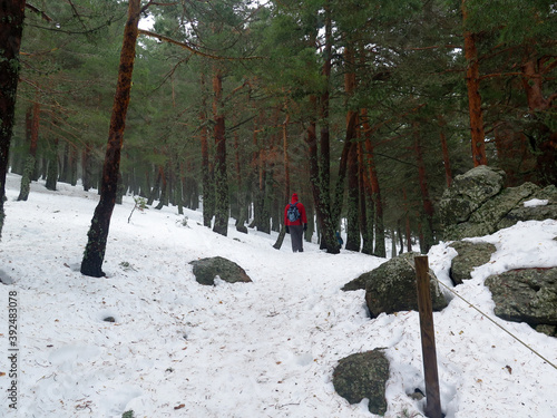 men climbing in the snow