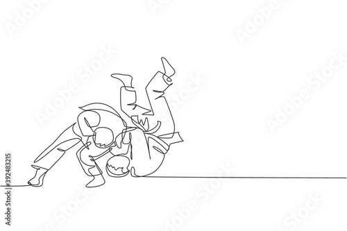 Single continuous line drawing of two young sportive judoka fighter men practice judo skill at dojo gym center. Fighting jujitsu, aikido sport concept. Trendy one line draw design vector illustration photo