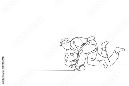 One continuous line drawing of two young sporty men training judo technique at sport hall. Jiu jitsu battle fight sport competition concept. Dynamic single line draw graphic design vector illustration