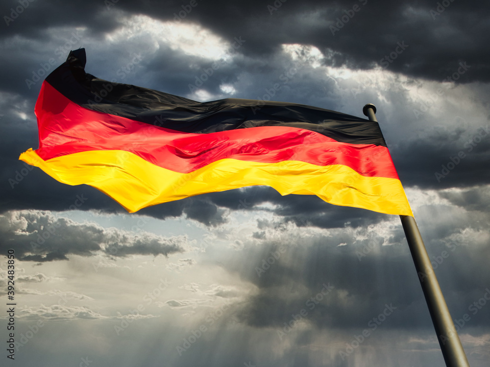 Flag of the Federal Republic of Germany on the flagpole