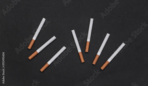 Lots of cigarettes on black background