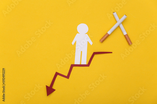 Fotografija Social degradation: The paper man descends the carter and social ladder due to n