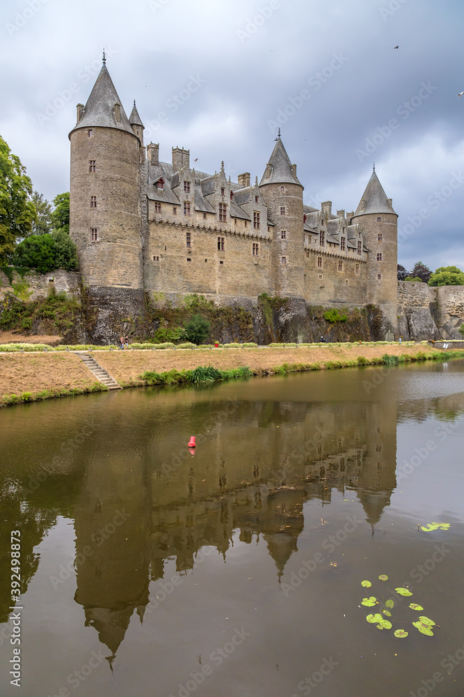 Josselin, France. Scenic view of the castle and its reflection in the river