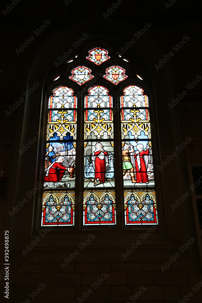 Josselin, France. Beautiful stained glass window in the Notre-Dame du Roncier Basilica