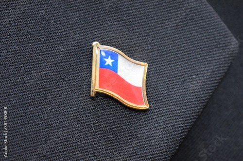 Chile flag lapel pin on a suit