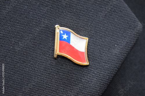 Obraz na plátne Chile flag lapel pin on a suit