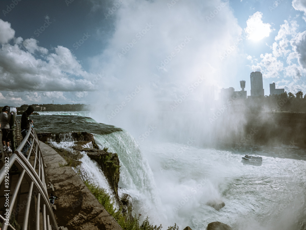 View of upper Niagara river falls down to niagara falls from top