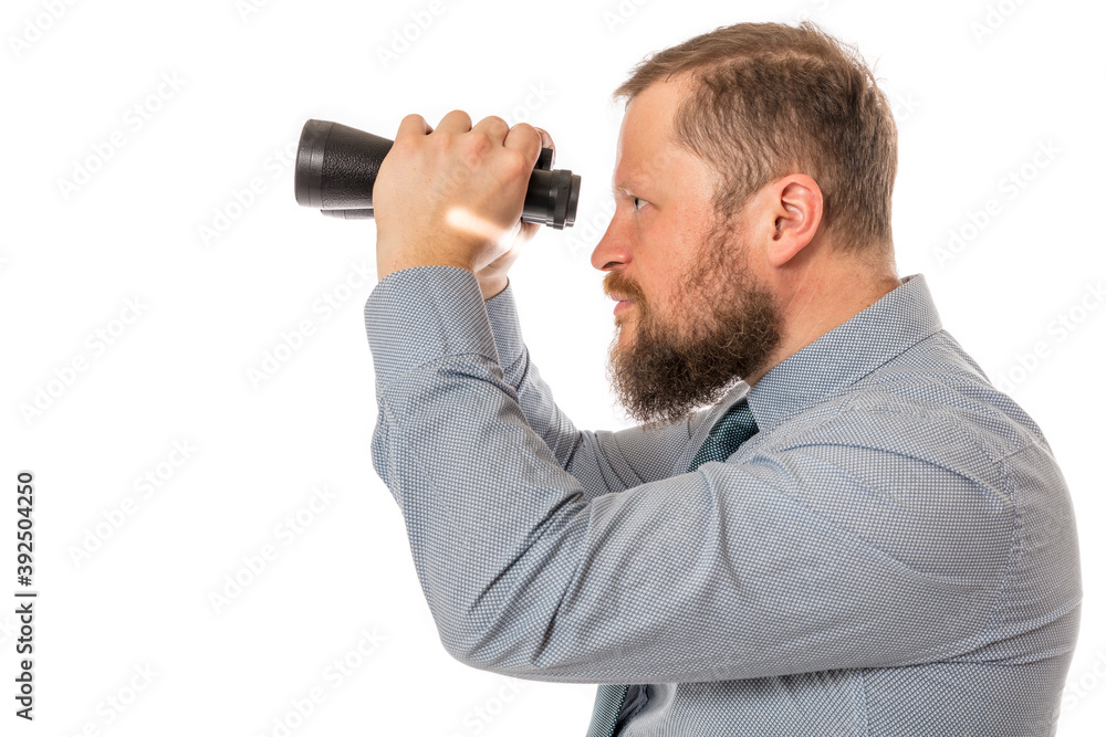 Soilid bearded man in shirt with binoculars Soilid bearded man in shirt with binoculars