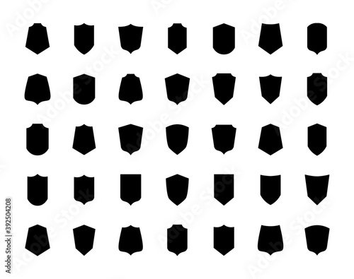 Shield black badges. Different shield shapes icons collection. Emblems template for sport club, military and security coat of arms, heraldic element flat vector silhouette isolated on white background