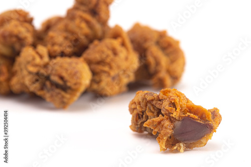 Fried and Crispy Chicken Gizzards on a White Background
