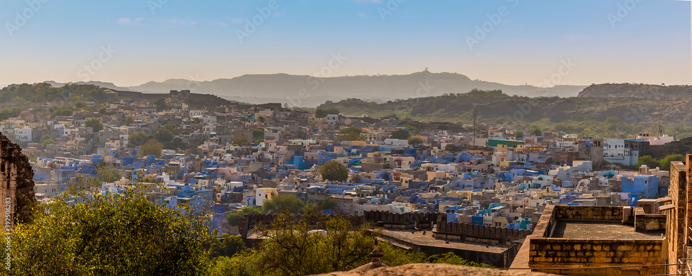 A panorama view across the blue city of Jodhpur, Rajasthan, India in the late afternoon
