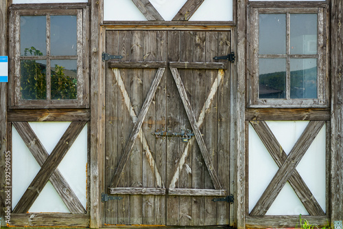 vintage entrance doors made of aged natural wood