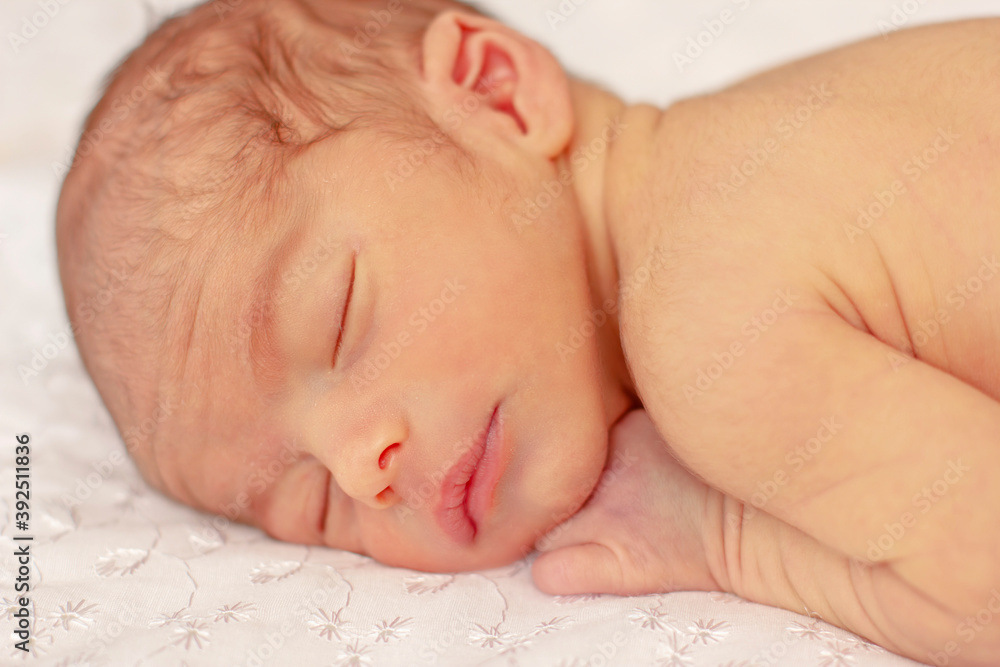 Sleeping newborn baby. Beautiful baby face close-up. Sleeping newborn baby. Beautiful baby face close-up.