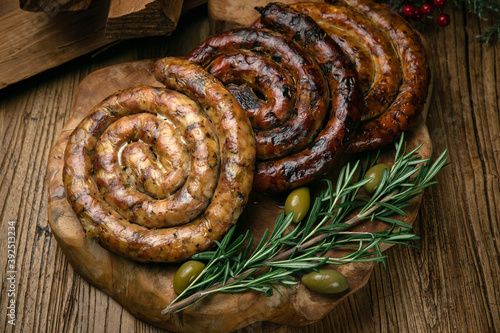 Christmas German sausages on a decorated wooden table 