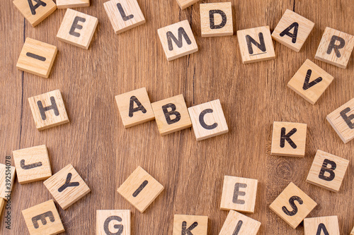 Alphabets on wooden cubes as a background