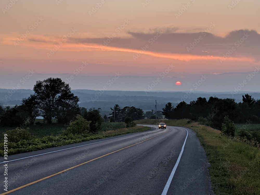 sunset over the highway