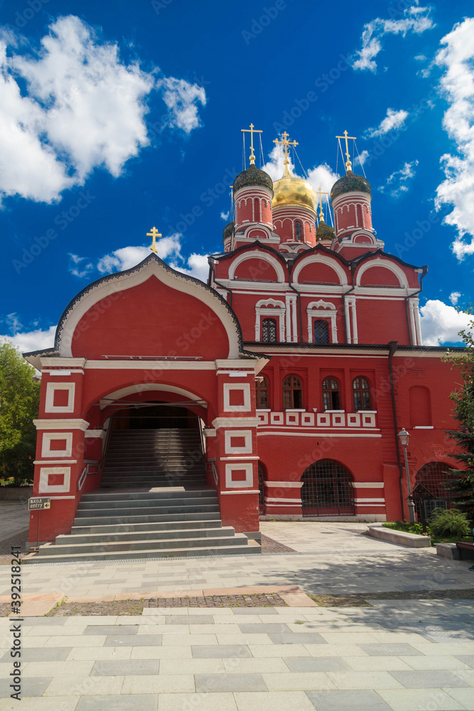 Fototapeta premium Facade of red brick Christian cathedral building in Moscow