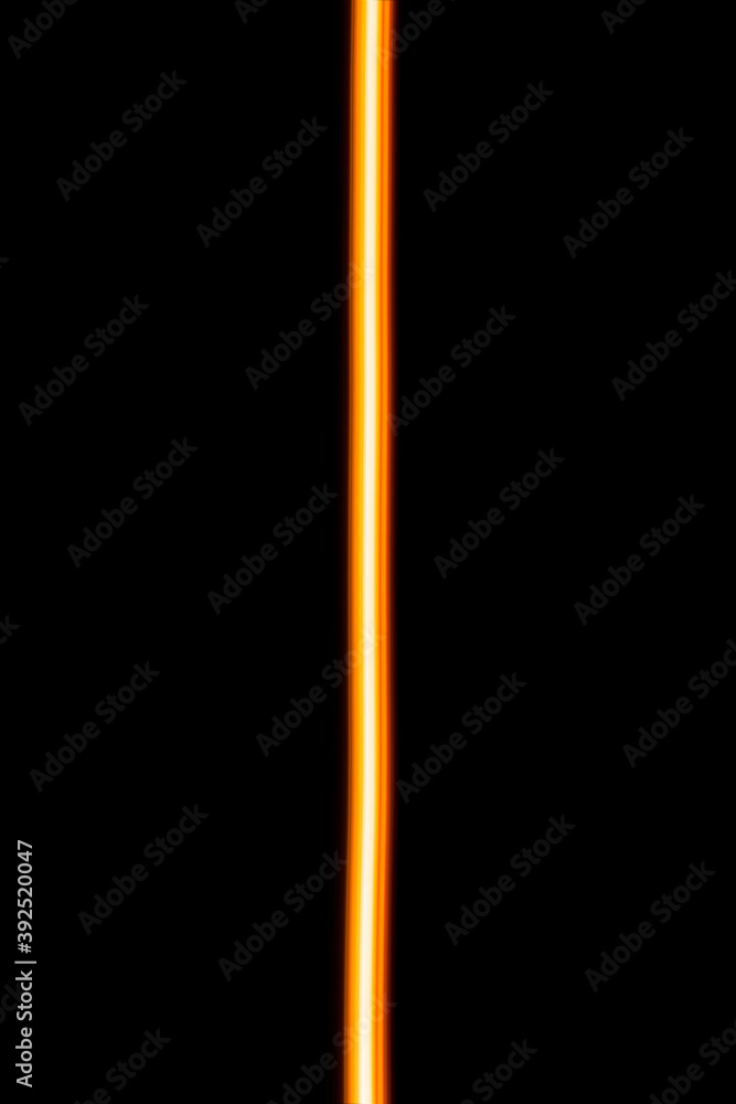 straight yellow light lines on a black background straight yellow light lines on a black background
