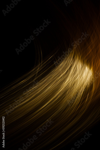 thin rounded yellow and white light lines on a black background