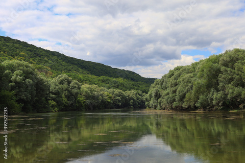 Very beautiful river water surface. Natural green background. photo